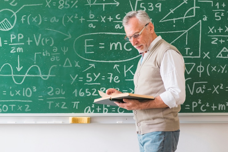 PSD math teacher looking into book