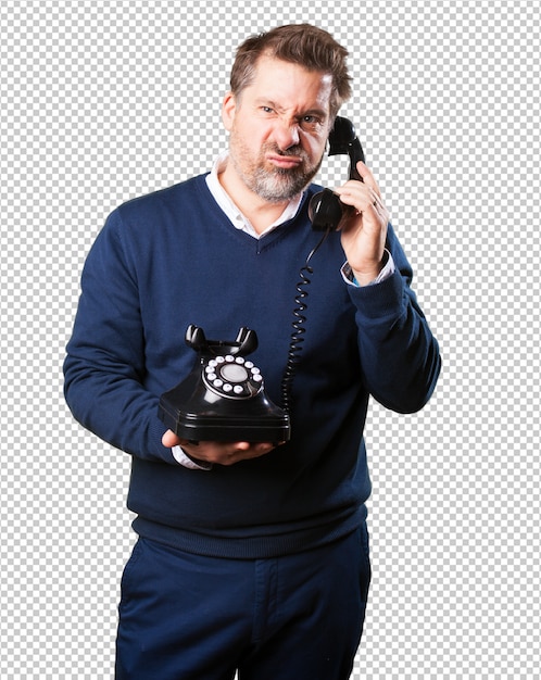 Mature man angry talking on telephone