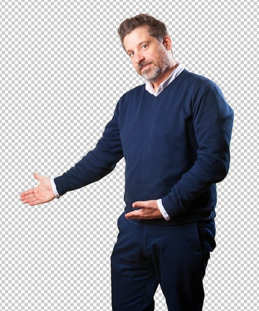 Mature man doing a welcome gesture