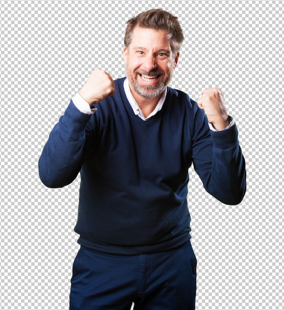 Mature man doing a winner gesture