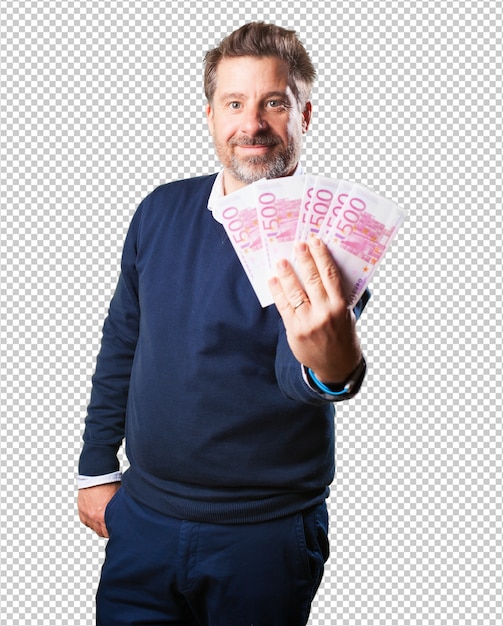 mature man holding banknotes
