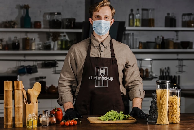 Medium shot chef wearing face mask