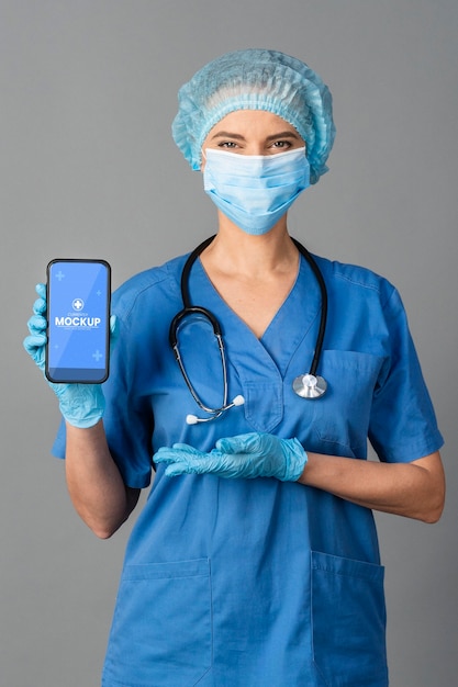 PSD medium shot doctor holding phone