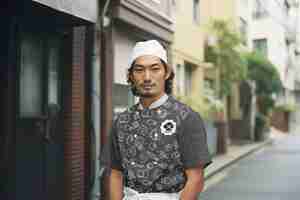 PSD medium shot man wearing japanese chef uniform