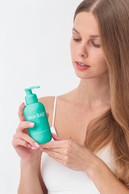 Medium shot model holding cream