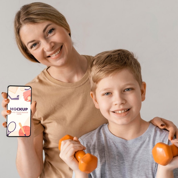 medium shot mother and kid exercise