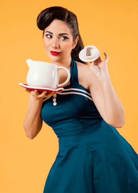 PSD medium shot woman holding tea pot mockup