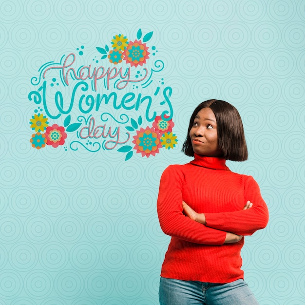 Medium shot woman posing with blue background