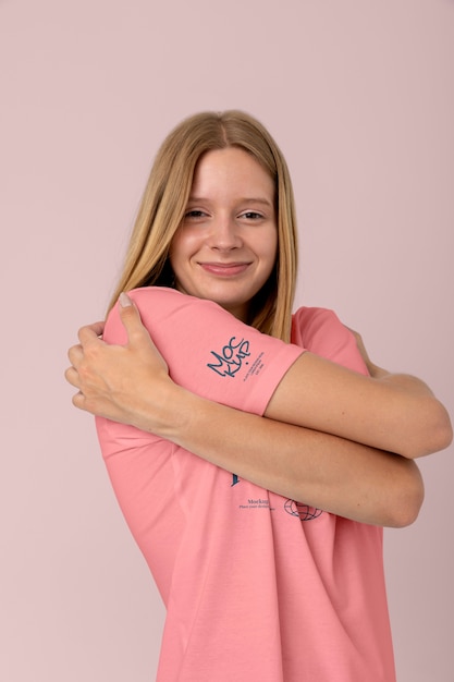 Medium shot woman posing with t-shirt