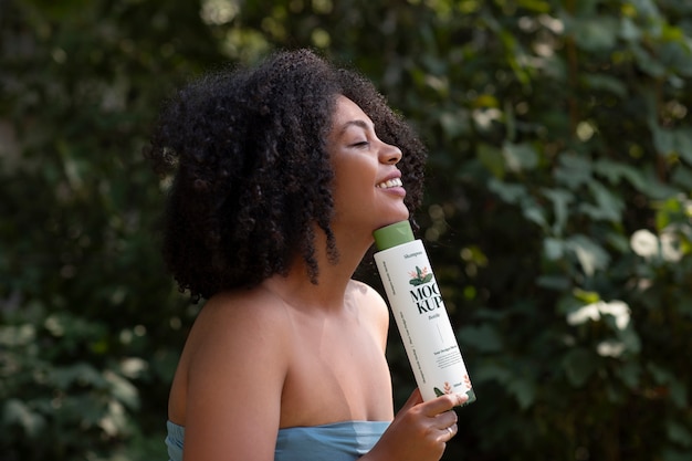 PSD medium shot woman using curly hair shampoo