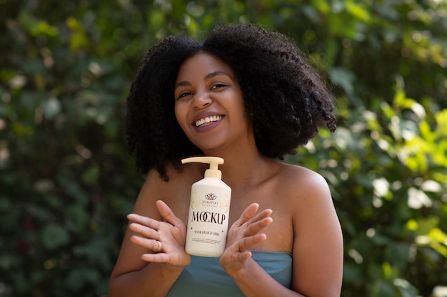 PSD medium shot woman using curly hair shampoo