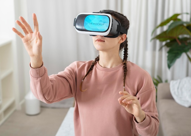 Medium shot woman wearing vr glasses