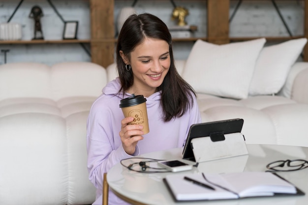 Medium shot woman with tablet