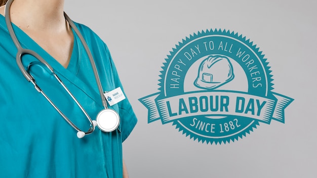 PSD medium view of woman with stethoscope and labour day badge