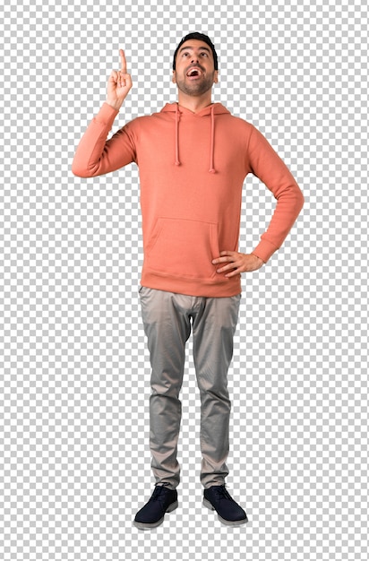 PSD mens in een roze sweatshirt die en een idee bevinden denken een idee die de vinger benadrukken