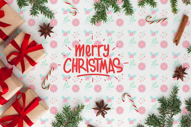 PSD merry christmas on floral background top view