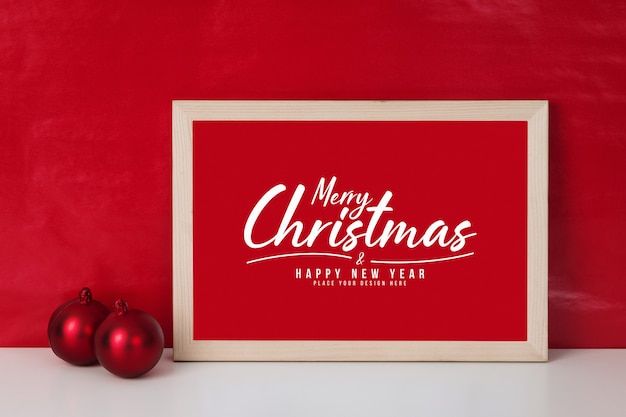 Merry christmas greeting card in frame mockup