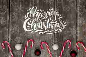 PSD merry christmas message beside candy cane