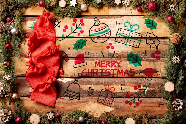 PSD mock-up del messaggio di buon natale su fondo di legno