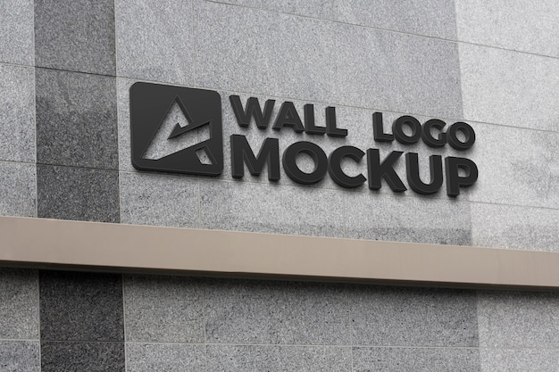 metal logo mock-up on concrete wall