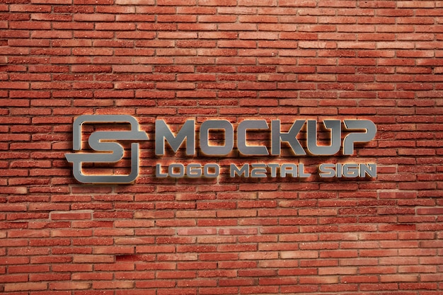 PSD design mock-up con logo in metallo su parete esterna in mattoni rossi