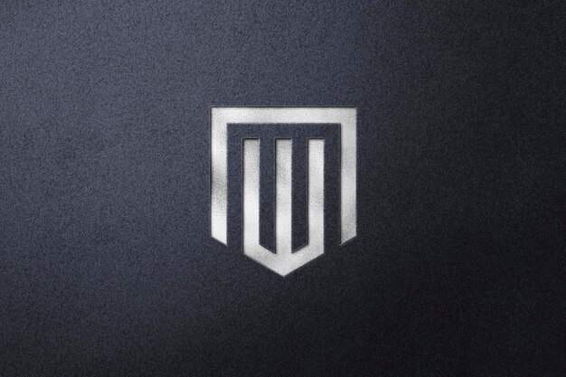 Metalic silver logo mockup with debossed effect on textured background