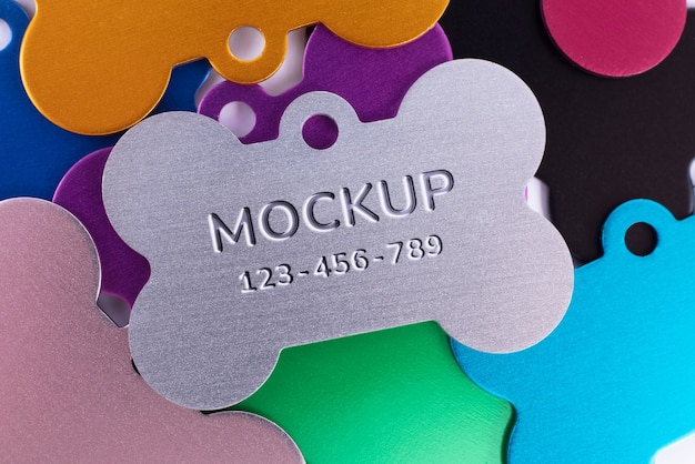PSD metallic pet name tag mock-up with engraved text effect