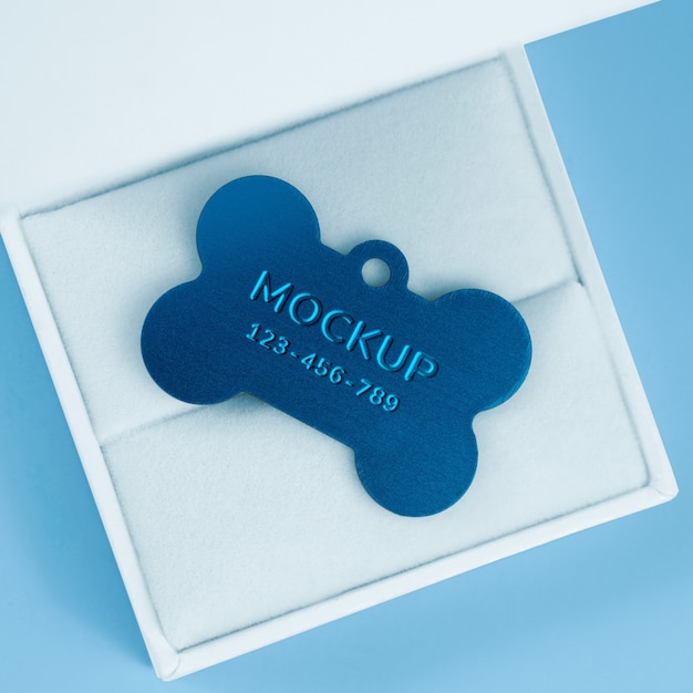 PSD metallic pet name tag mock-up with engraved text effect