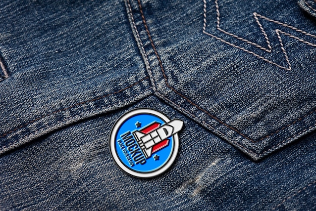 PSD metallic pin on denim material