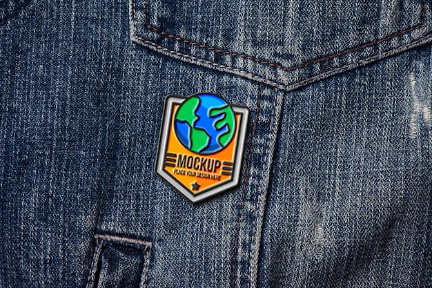 PSD metallic pin on denim material