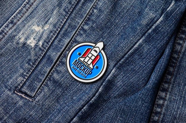 Metallic pin on denim material