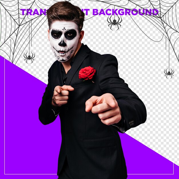 Mężczyzna ubrany na Halloween w tradycyjny meksykański kostium wskazujący do przodu z przezroczystym plecami