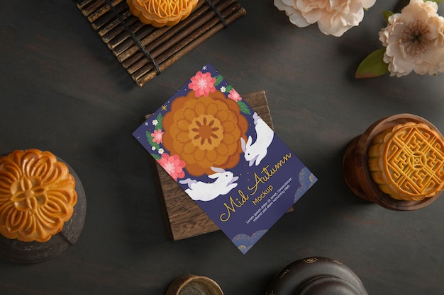 PSD mid-autumn festival celebration card mock-up with moon cake dessert