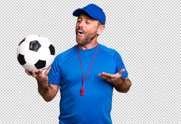 PSD middle age man sport coach concept with a soccer ball