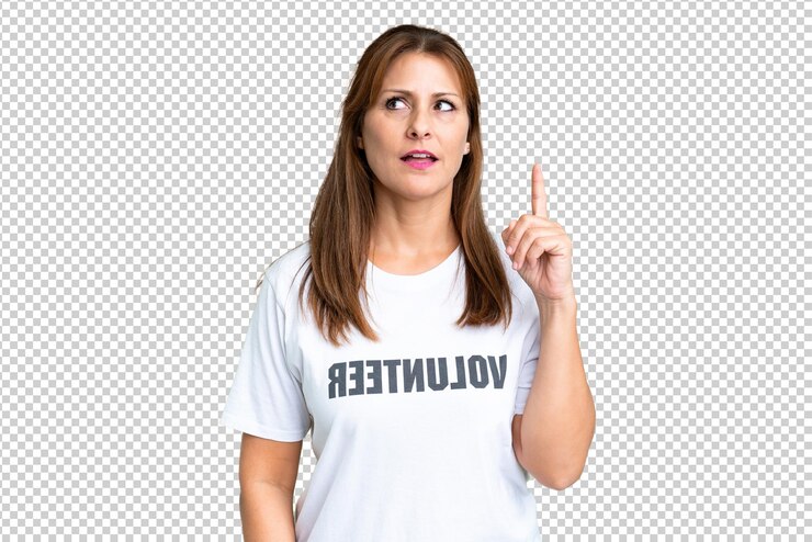 PSD middle age volunteer woman over isolated background thinking an idea pointing the finger up