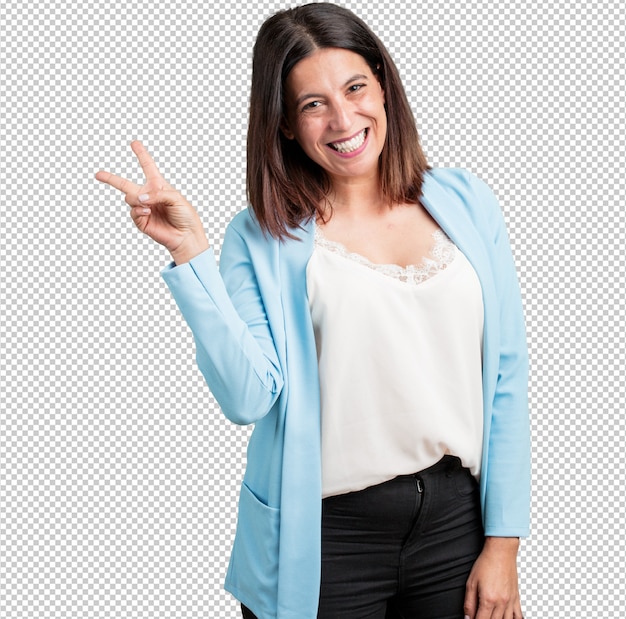 middle aged woman fun and happy, positive and natural, makes a gesture of victory, peace concept