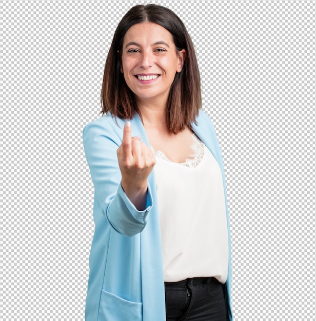 Middle aged woman inviting to come, confident and smiling making a gesture with hand, being positive and friendly