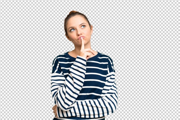 PSD military with dog tag over isolated chroma key background surprised and pointing side
