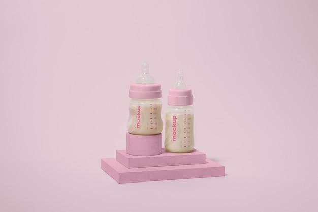 Milk baby bottles with geometric shapes