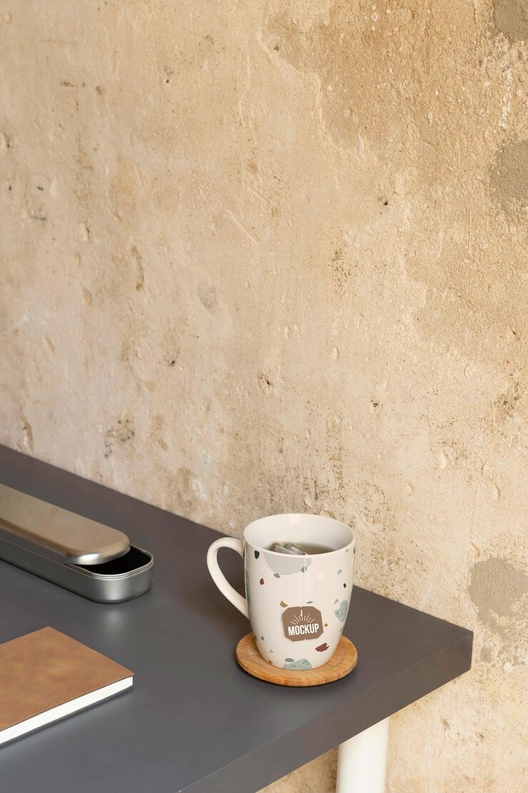 PSD minimal desk design with cup mockup