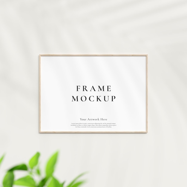 Minimal frame mockup met palmschaduw en plant poster fotolijst mockup