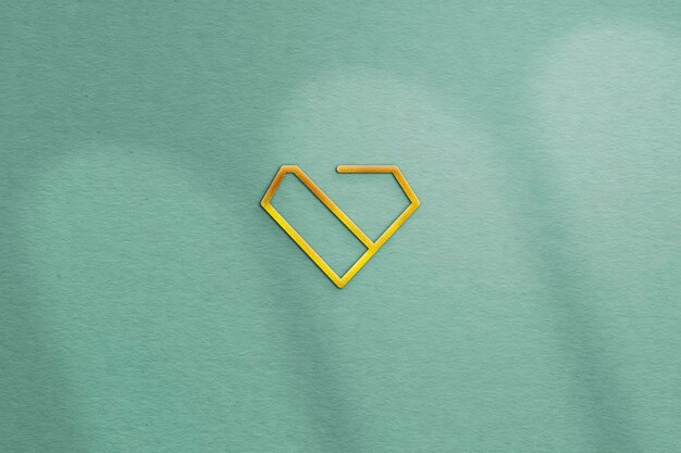 Minimal Gold Logo Mockup with Embossed Effect on Colored Wall Texture