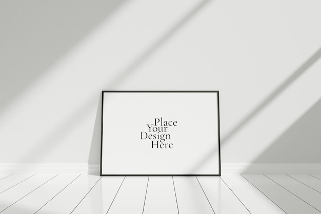 Poster nero orizzontale minimalista e pulito o mockup di cornice per foto sul pavimento appoggiato alla parete della stanza con ombra Psd Premium