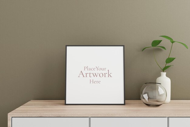 Minimalist and clean square black poster or photo frame mockup on the wooden table in living room with vase and plant