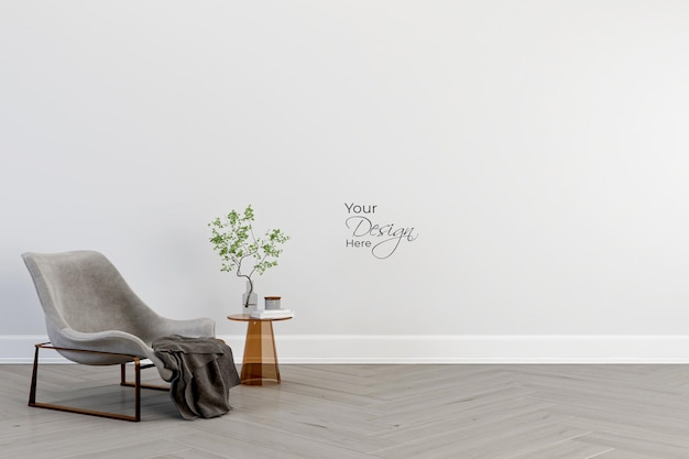 Minimalist interior of living room with armchair and leaf on white wall