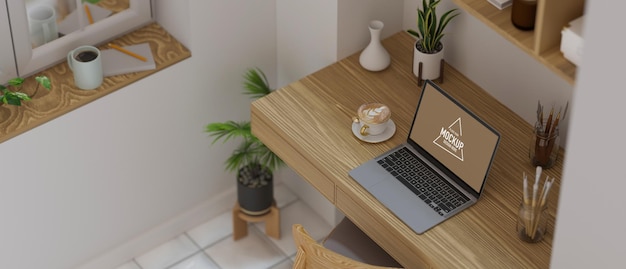 minimalistic working space cozy working room laptop empty screen with decor stuff on wooden table