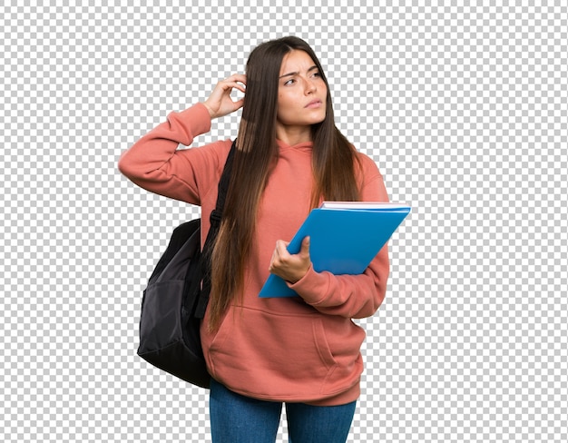 Młoda studencka kobiety mienia notatniki ma wątpliwości podczas gdy drapający głowę