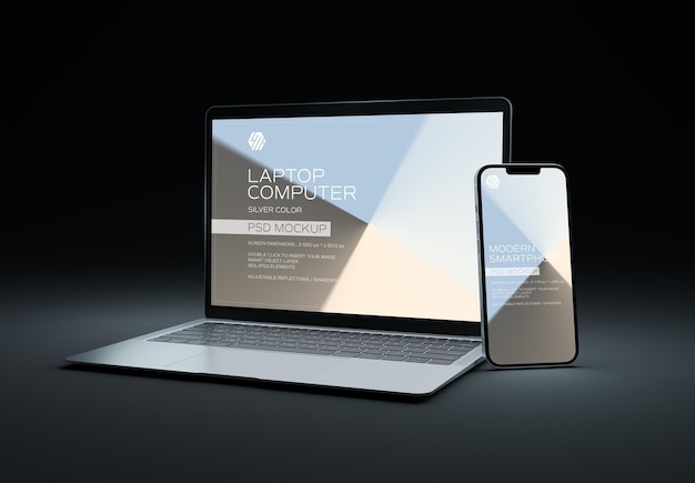 Mobiele telefoons en laptops op donkere mockup