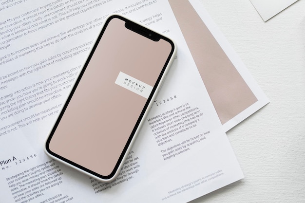 Mobile phone mockup on a paper