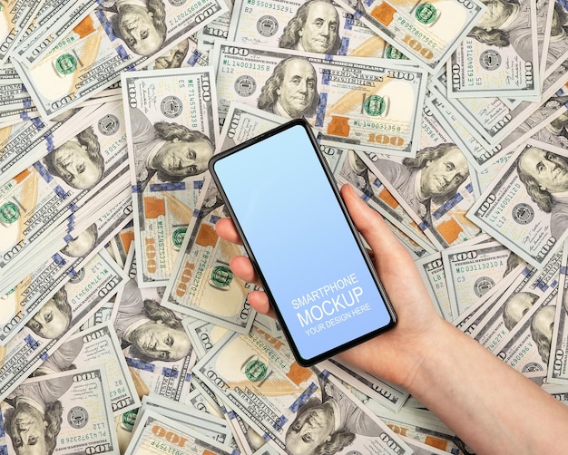휴대 전화 모형 화면은 금융 앱을 위한 달러 지폐 돈을 조롱합니다.